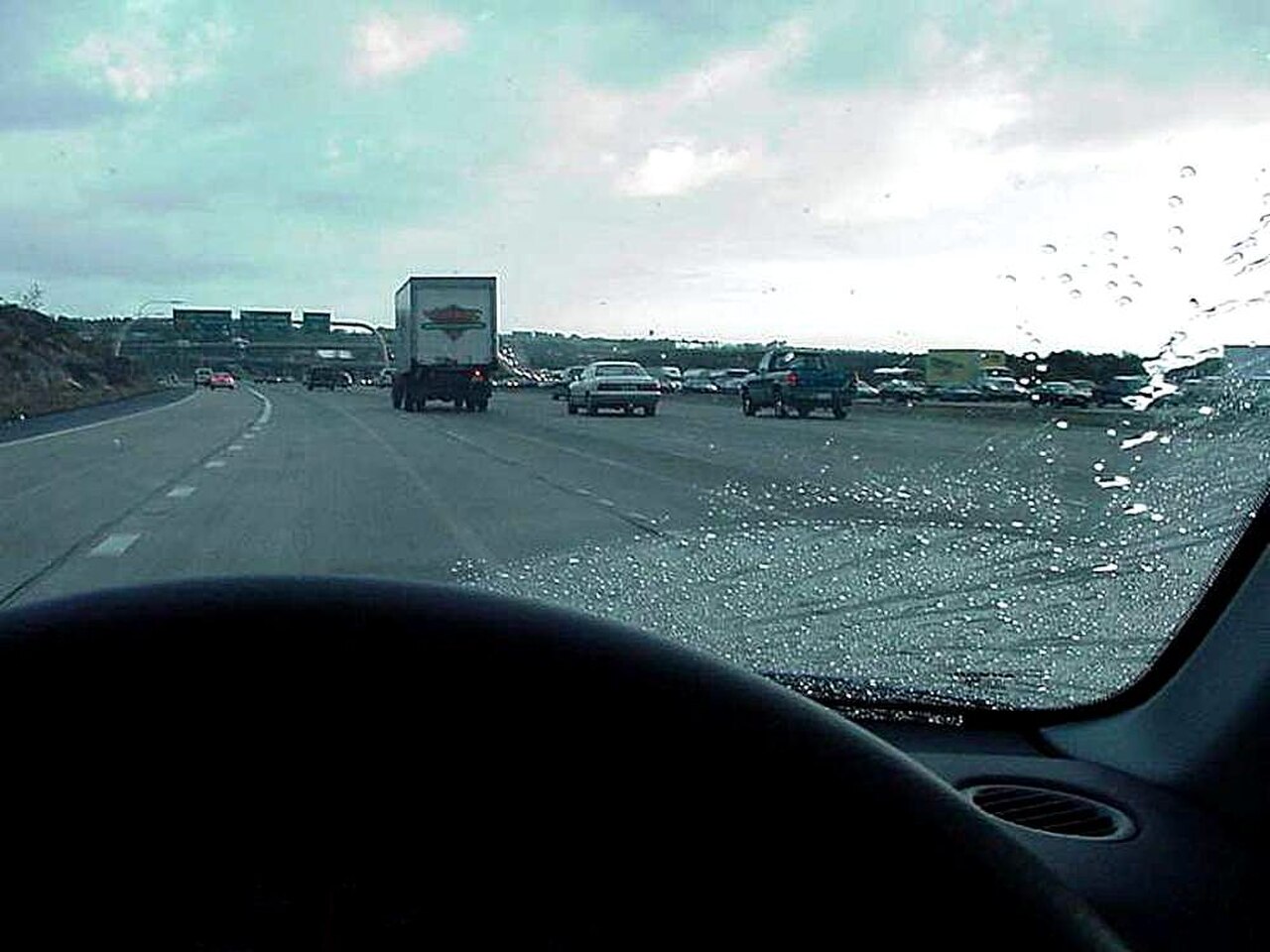 Driving rain road cars.jpg