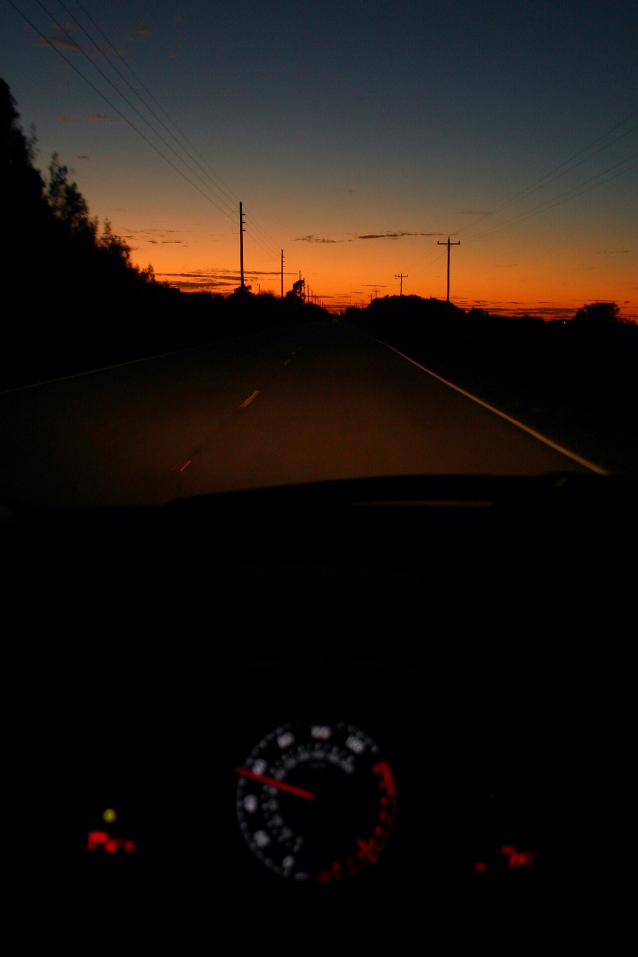 Driving Into an Okeechobee Sunset (30733204862).jpg